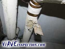 Asbestos insulation on steam heat piping. WAVE Home Inspector MA